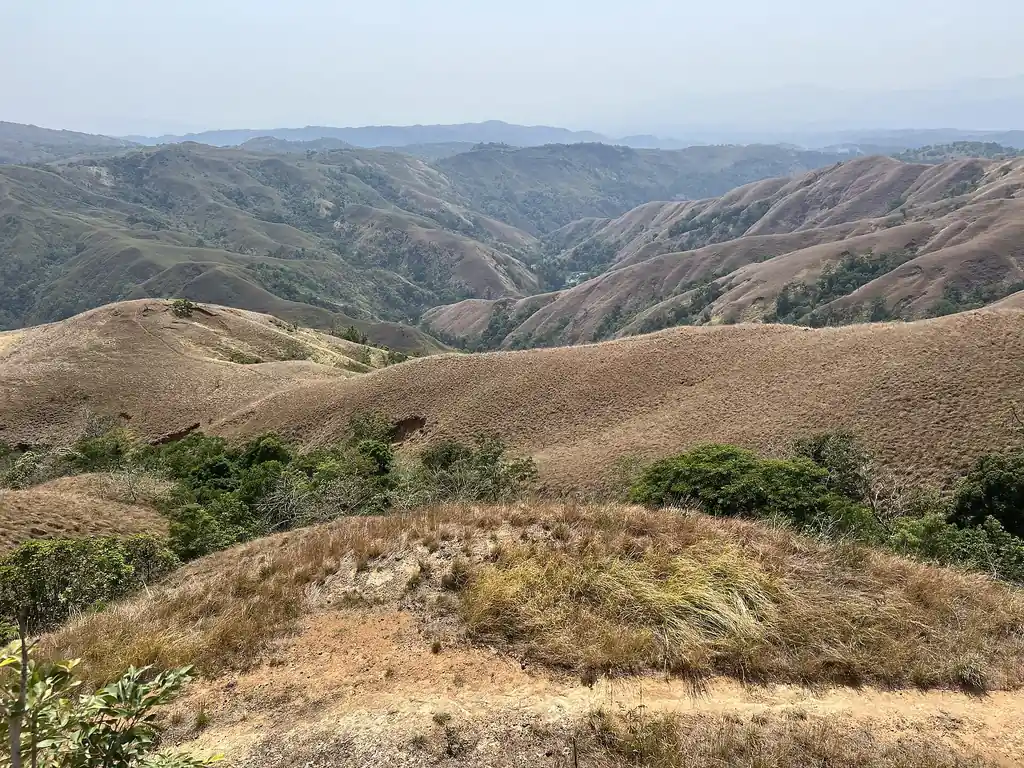 The grassy Apao Rolling Hills in Tineg, Abra