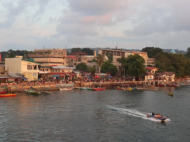 The Isabela City riverside at sunset