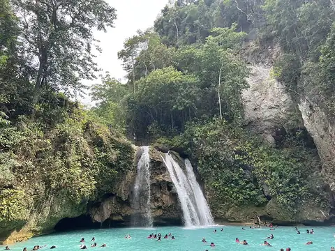 The first level of Kawasan Falls dropping into a blue pool