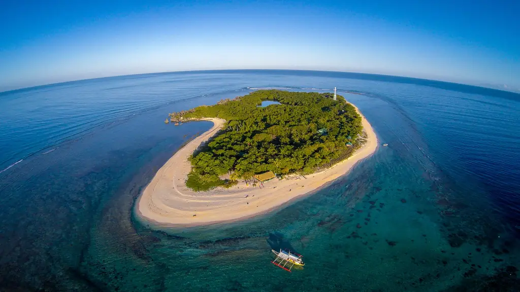 Apo Island and its reef in Apo Reef Natural Park, from the air