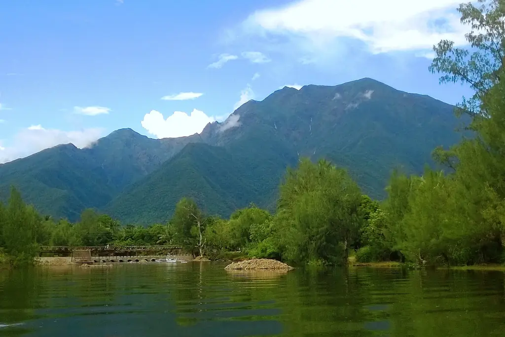 Mount Guiting-Guiting rising above a river on Sibuyan Island, seen from España